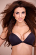 Photo: Busty woman modeling a bikini Busty woman modeling a bikini