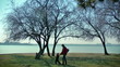 Mother and little boy having a walk in the park