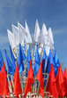 colored flags on a blue sky background