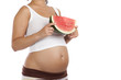 pregnant woman with watermelon, isolated