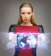 futuristic woman with tablet pc