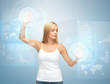 businesswoman touching virtual screen
