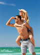 couple having fun on the beach