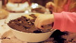 Little girl baking a cake shallow DOF