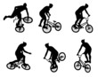 stunt bicyclist silhouettes - vector