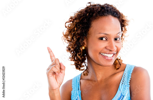 Photo: Black woman pointing an idea Black woman pointing an idea
