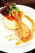Small portion of food on big plate close up