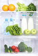Open refrigerator with vegetarian food