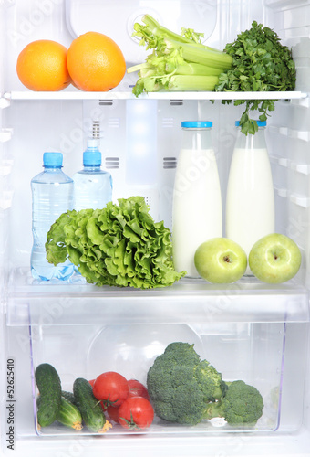 Photo: Open refrigerator with vegetarian food Open refrigerator with vegetarian food
