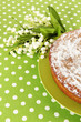 Delicious poppy seed cake on table close-up