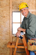 Contractor Leaning on Ladder
