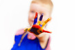 Photo: happy child with paint on the hands happy child with paint on the hands