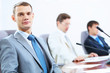 Three businesspeople at meeting