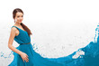 Photo: Woman in dress in wave like manner Woman in dress in wave like manner