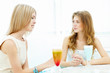 Young woman with a glass of drink
