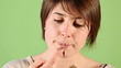 Young Woman Eating Chocolate Cream