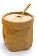 rice in gunny with a wooden spoon