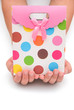 hands holding a  gift box on white with clipping path