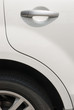 door and tyre for a white car
