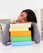 Young Woman Sleeping While Studying
