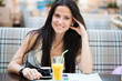 Portrait of beautiful latin woman drinking coffee