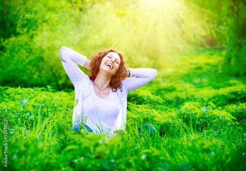 Photo: Beautiful Young Woman Outdoors. Enjoy Nature Beautiful Young Woman Outdoors. Enjoy Nature