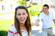Couple holding hands while climbing stairs