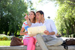 Couple of tourists relaxing in park