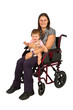 Photo: A smiling girl with a baby in a wheelchair isolated on white ba A smiling girl with a baby in a wheelchair isolated on white ba