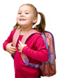 Portrait of a cute little schoolgirl with backpack