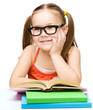 Photo: Little girl is reading a book Little girl is reading a book