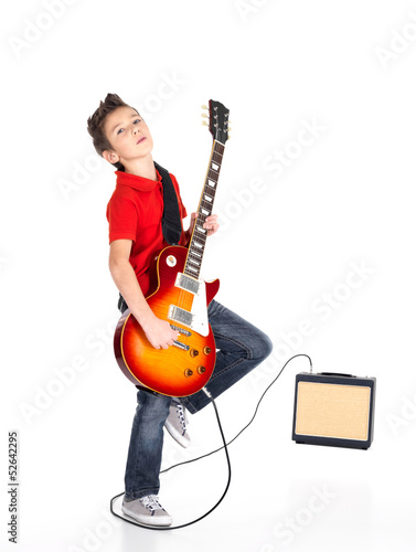 Photo: white boy sings and plays on the electric guitar white boy sings and plays on the electric guitar