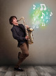 Young musician playing on saxophone while musical notes explodin