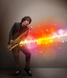 Young man playing on saxophone with colorful sound waves