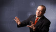 Photo: Elegant businessman touching copy space Elegant businessman touching copy space