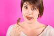 Young Woman Eating Chocolate Cream