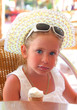 Foto: cute little girl with ice-cream cute little girl with ice-cream