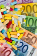 euro bank notes and tablets