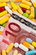 Photo: euro bank notes and tablets euro bank notes and tablets