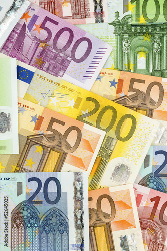 Photo: many euro banknotes many euro banknotes