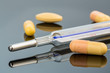 thermometer and pills