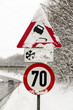 traffic signs and snow