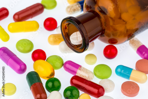 Photo: many tablets with container many tablets with container