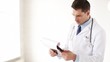 male doctor making a prescription