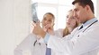 two doctors with x-ray prints