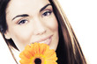 Photo: woman portrait with flower in studio woman portrait with flower in studio