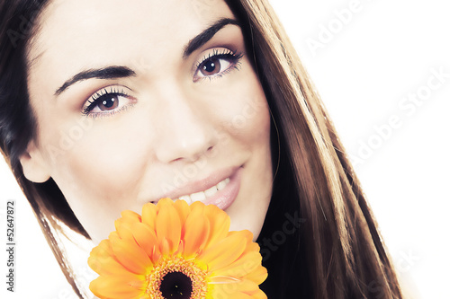 Photo: woman portrait with flower in studio woman portrait with flower in studio