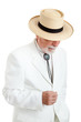 Photo: Senior Man in White Suit and Panama Hat Senior Man in White Suit and Panama Hat