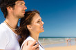 couple on the ocean beach in summer vacation