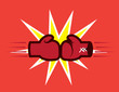 Boxing gloves hitting together with explosive background